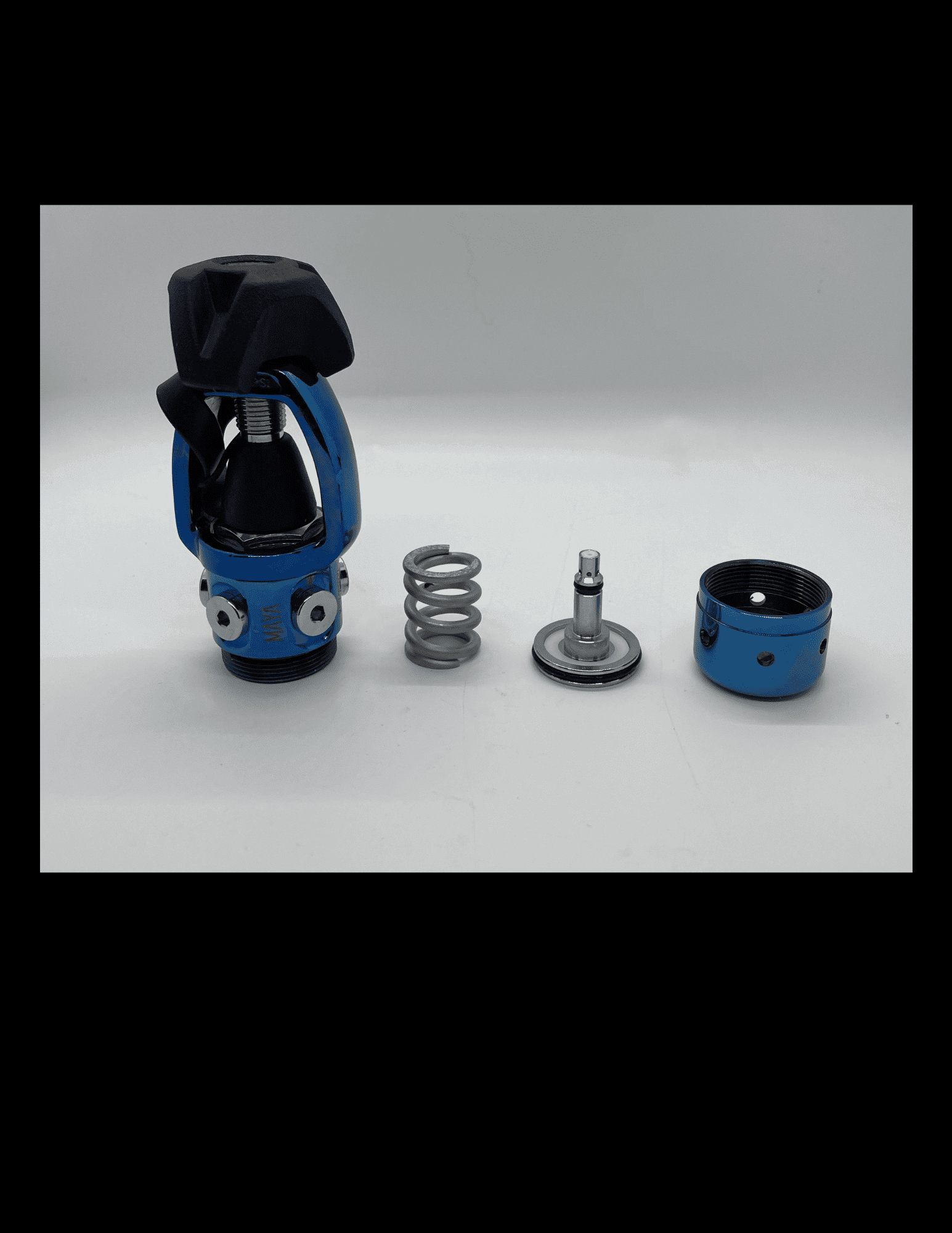 Disassembled blue mechanical component with springs and metal parts.